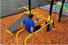 Custom Designs for Outdoor Workout Stations with person working out.